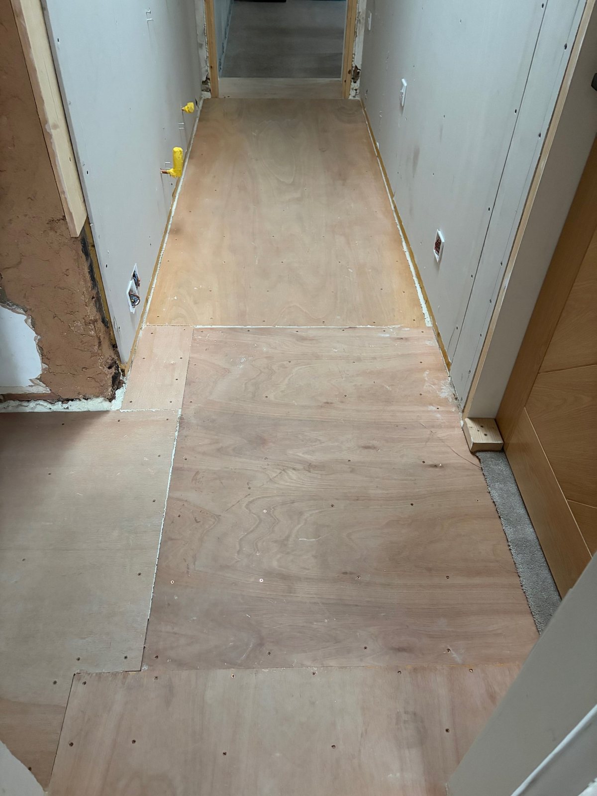Airdrie hallway before floor tiling by Herringbone of Lanark