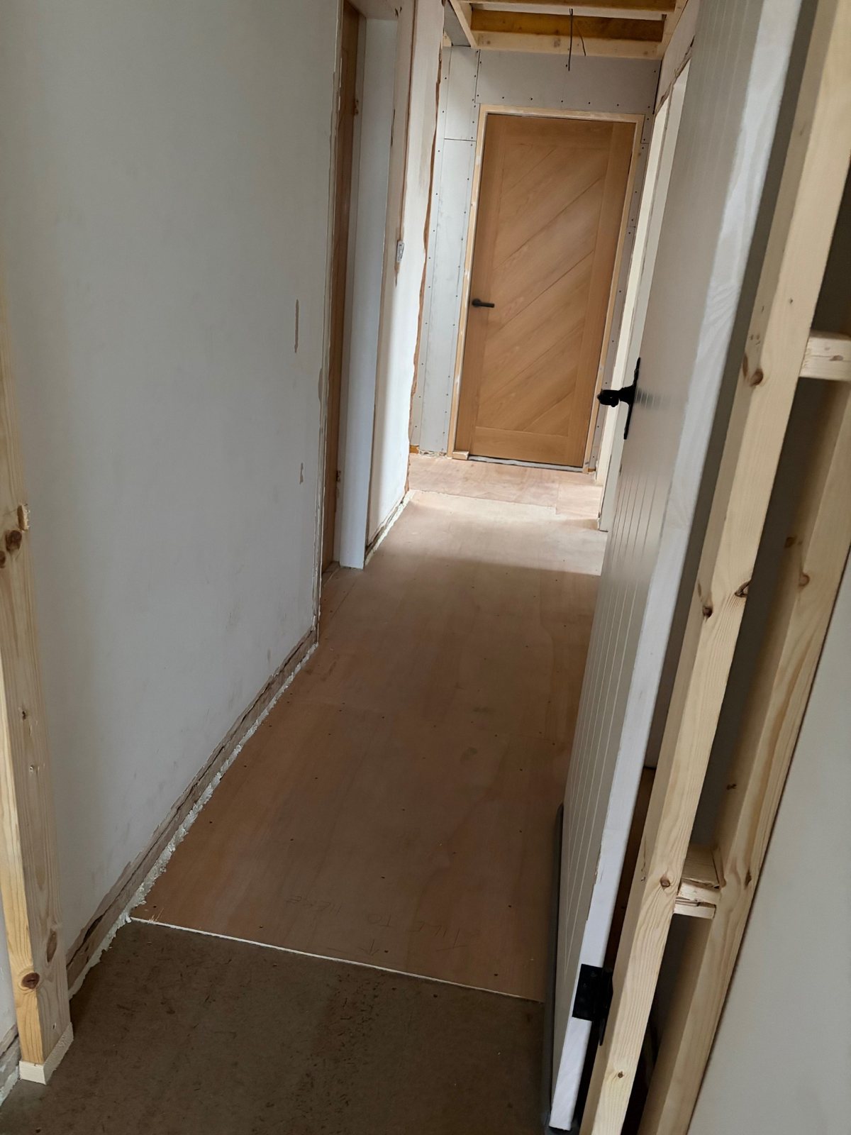 Airdrie hallway before patterned floor tiles were installed