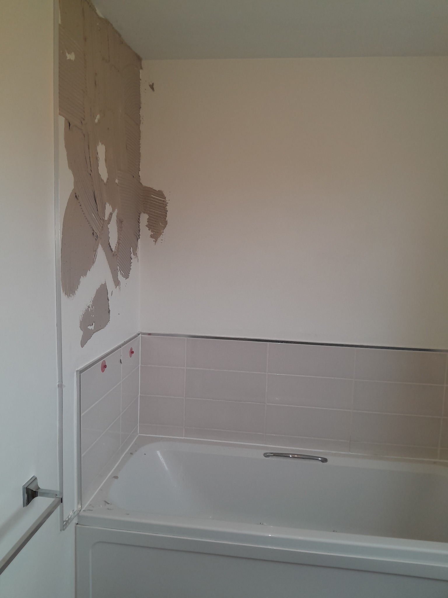 Bathgate bathroom wall before new tiling by Herringbone of Lanark